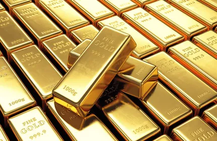 Oro in lieve calo, tensioni sul dollaro in attesa di dati inflazionistici USA